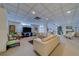 Bright and spacious community living room with stylish furnishings and plenty of seating for residents at 30 Turner St # 203, Clearwater, FL 33756