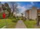 Scenic pathway leading to the waterfront with lush greenery and beautiful waterfront views at 30 Turner St # 203, Clearwater, FL 33756