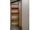 Practical storage area with sturdy wooden shelves, providing ample space for organization at 30 Turner St # 203, Clearwater, FL 33756
