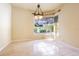 Cozy breakfast nook area with lots of light from the bay window overlooking the back yard at 3015 Northfield Dr, Tarpon Springs, FL 34688