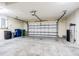 Spacious garage with ample storage space and modern garage door opener for convenience and security at 3015 Northfield Dr, Tarpon Springs, FL 34688