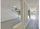 Attached garage with a gray floor and access to exterior fencing at 3101 W El Prado Blvd # B, Tampa, FL 33629