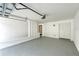 Clean and bright garage with a gray floor and access to the home's interior at 3101 W El Prado Blvd # B, Tampa, FL 33629