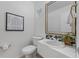 Stylish half bathroom with modern fixtures, clean lines, and a decorative mirror adds a touch of elegance at 3101 W El Prado Blvd # B, Tampa, FL 33629