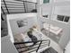 Bright interior with high ceilings, large windows, and a view of the stylish courtyard at 3101 W El Prado Blvd # B, Tampa, FL 33629