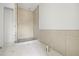 Modern bathroom with a spacious shower stall and neutral-toned tiling at 3207 N Florida Ave # 1, Tampa, FL 33603