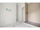 Bathroom featuring a tiled shower stall and rough-in plumbing at 3207 N Florida Ave # 1, Tampa, FL 33603