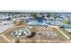 Community featuring a pool, clubhouse, tennis, shuffleboard, and miniature golf at 35145 Garber Ln, Zephyrhills, FL 33541