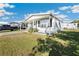 Charming one story home with carport and covered porch at 35145 Garber Ln, Zephyrhills, FL 33541