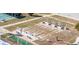 This aerial view showcases a shuffleboard court with benches in the community at 35145 Garber Ln, Zephyrhills, FL 33541