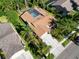 Aerial view of the property showing the layout, pool, and surrounding neighborhood at 375 Holly Hill Rd, Oldsmar, FL 34677