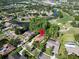 Beautiful aerial image of a residential area close to a golf course and waterfront at 375 Holly Hill Rd, Oldsmar, FL 34677