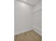 Walk-in closet with wire shelving and neutral paint at 375 Holly Hill Rd, Oldsmar, FL 34677