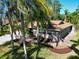 Inviting home featuring lush landscaping and a well-maintained front yard at 375 Holly Hill Rd, Oldsmar, FL 34677