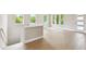 Hardwood floors featuring a staircase to the second floor at 4017 W North B St, Tampa, FL 33607