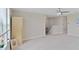 Upstairs loft area with neutral carpeting, providing a versatile space for recreation or relaxation at 4136 Shrewbury Pl, Land O Lakes, FL 34638