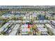 Overhead view showing the property's location with nearby lakes, roads and lush landscaping at 4215 Regal Pl, New Port Richey, FL 34652