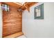 Walk-in closet with a cedar plank wall, shelves, and clothing racks at 4215 Regal Pl, New Port Richey, FL 34652