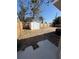 Large backyard with a storage shed, enclosed by a wooden fence at 4731 Foothill Dr, Holiday, FL 34690