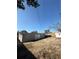 Wide angle view of backyard and house showing exterior and outdoor space at 4731 Foothill Dr, Holiday, FL 34690