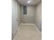 Clean laundry room with washer and dryer hookups at 4731 Foothill Dr, Holiday, FL 34690