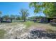 Expansive backyard with carport, RV and building at 4814 Knights Loop, Plant City, FL 33565