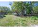 Spacious yard with an array of trees and open spaces at 4814 Knights Loop, Plant City, FL 33565