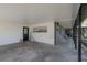 Spacious carport featuring modern design elements, offering ample parking and protection from the elements at 4814 Knights Loop, Plant City, FL 33565