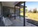 Inviting front porch, featuring decorative benches and easy access to outside at 4814 Knights Loop, Plant City, FL 33565