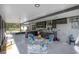A bright and modern kitchen with bar seating, outdoor views and outdoor decor at 4814 Knights Loop, Plant City, FL 33565
