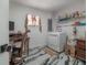 Laundry and office space featuring black and white modern floors, and a workstation at 4814 Knights Loop, Plant City, FL 33565