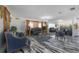 Expansive living room with decorative furniture and sleek marble flooring at 4814 Knights Loop, Plant City, FL 33565