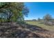 Lush land with mature trees, offering privacy and a natural landscape at 4814 Knights Loop, Plant City, FL 33565