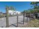 Fenced area with a recreational vehicle and a clear blue sky at 4814 Knights Loop, Plant City, FL 33565