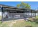 Screened porch offering an outdoor living space, complete with seating for relaxation and views of the yard at 4814 Knights Loop, Plant City, FL 33565