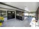 A spacious sunroom offers a casual dining area and features views of the outdoors at 4814 Knights Loop, Plant City, FL 33565