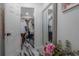 Spacious walk-in closet featuring marble-look flooring, ample hanging space, and shelving for shoes and accessories at 4814 Knights Loop, Plant City, FL 33565