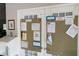Twin bulletin boards mounted on double doors, full of community notices and events at 5839 Garden Lakes Dr, Bradenton, FL 34203
