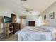 Bedroom featuring a ceiling fan, dressers, and a serene space at 5839 Garden Lakes Dr, Bradenton, FL 34203