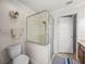 Clean bathroom with a glass-enclosed shower and neutral decor at 6107 Ibispark Dr, Lithia, FL 33547
