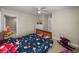 This is a cozy bedroom with lots of space for playing at 6107 Ibispark Dr, Lithia, FL 33547