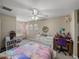 Charming bedroom with natural light, arched windows, and a cozy atmosphere at 6107 Ibispark Dr, Lithia, FL 33547