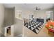 Versatile bonus room space with carpet, table, and play area at 6107 Ibispark Dr, Lithia, FL 33547