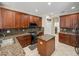 Functional kitchen with ample counter space, an island, and modern appliances, perfect for cooking at 6107 Ibispark Dr, Lithia, FL 33547
