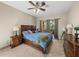 Serene main bedroom with ample space, balcony access, and decorative furnishings at 6107 Ibispark Dr, Lithia, FL 33547