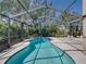 This large screened-in pool is surrounded by lush landscaping creating a private backyard oasis at 6107 Ibispark Dr, Lithia, FL 33547