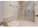 Bathroom featuring tiled floors and walls and a glass enclosed shower with a built in soap tray at 6177 Sun Blvd # 302, St Petersburg, FL 33715