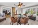 Cozy breakfast nook features a glass table, wicker chairs, and abundant natural light at 6300 6Th N Ave, St Petersburg, FL 33710