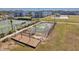 Aerial view of the community area with a basketball court and playground at 7459 Oxford Garden Cir, Apollo Beach, FL 33572
