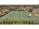 Aerial view of a tennis and basketball court in a community at 7459 Oxford Garden Cir, Apollo Beach, FL 33572